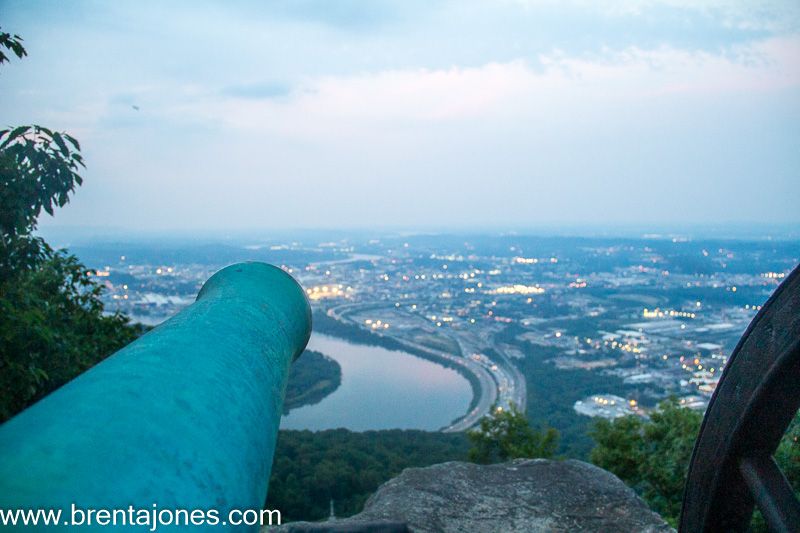 Green cannon barrel above the valley