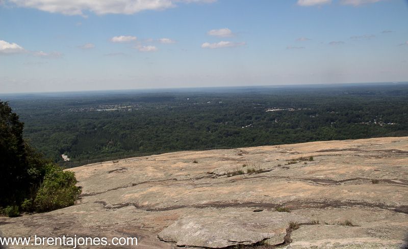 Stone Mountain's broad summit above distant forest